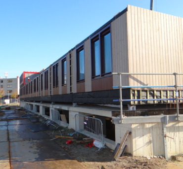 Thumbnail of http://Een%20rij%20woning%20modules%20bij%20Project%20Xylino%20Almere